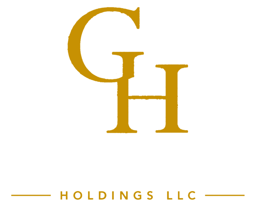 Gold letters GH above the words Graystead Holdings LLC on a white background. The text GRAYSTEAD is in large, light gray font; HOLDINGS LLC is smaller and gold, with lines on either side.